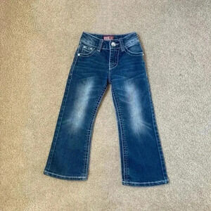 Kids red ranch jeans in size 4